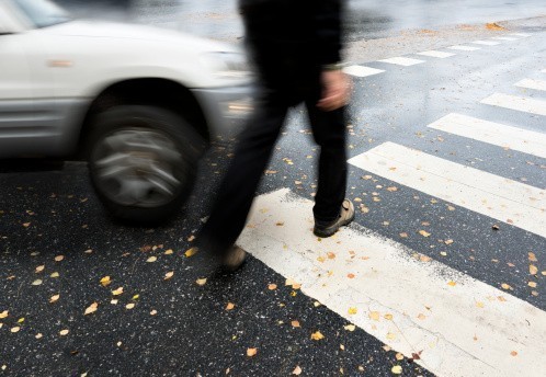 Pedestrian about to be hit by car