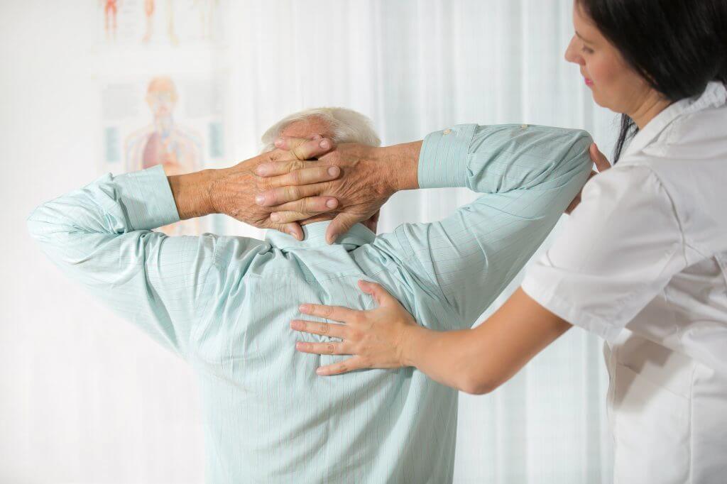 Man receiving spine treatment